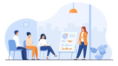 Die Frau schult Studenten.